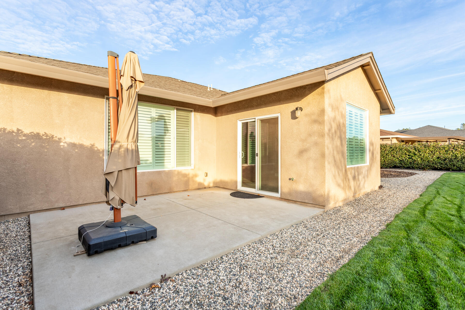 3241 Lemurian Road Redding, CA 96002 - Photo 31 of 34 a view of a house with backyard and porch