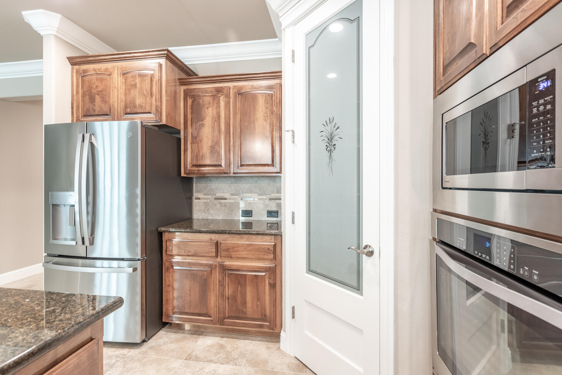 3241 Lemurian Road Redding, CA 96002 - Photo 10 of 34 a kitchen with stainless steel appliances granite countertop a refrigerator and a stove