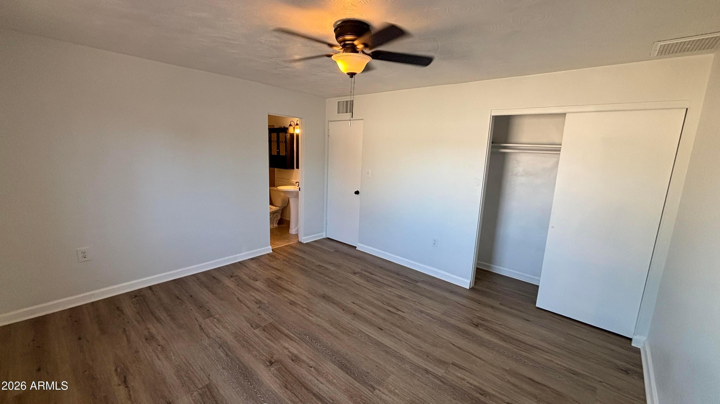 1000 West Elna Rae Street Tempe, AZ 85281 - Photo 18 of 22 a view of empty room with wooden floor