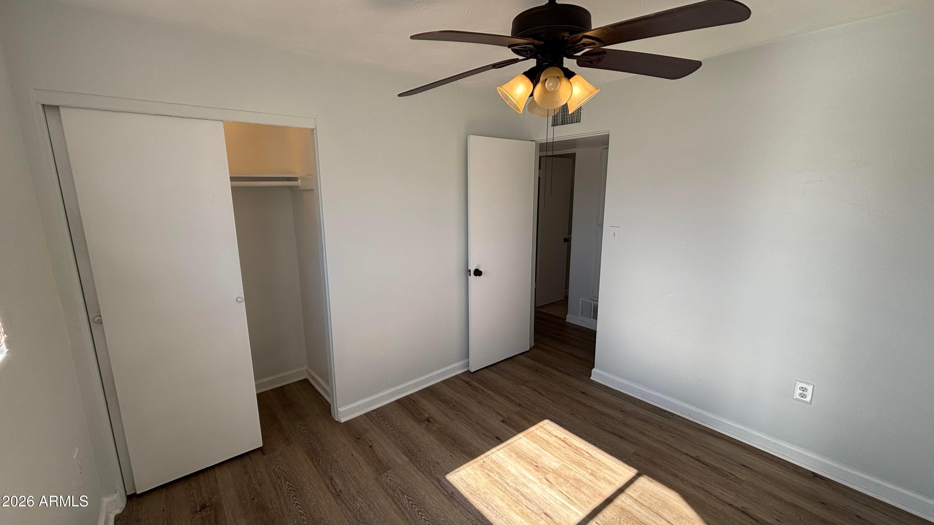 1000 West Elna Rae Street Tempe, AZ 85281 - Photo 10 of 22 a view of empty room with wooden floor