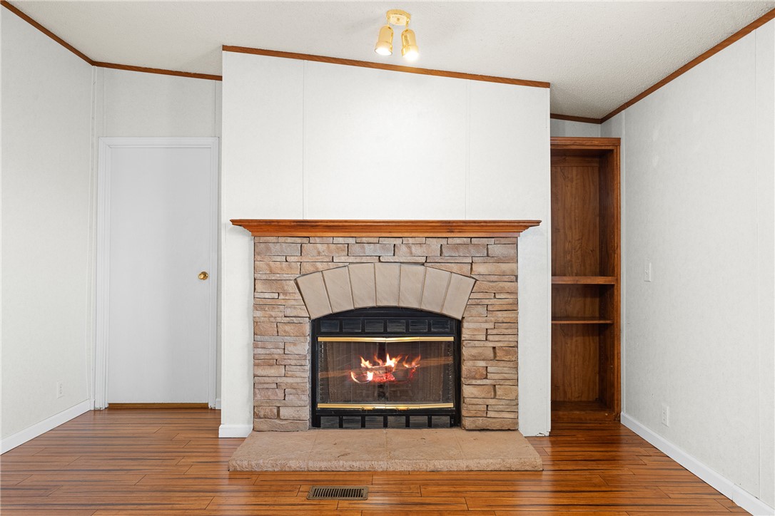 1099 Private Road 4041 Dime Box, TX 77853 - Photo 19 of 25 a living room with a fireplace