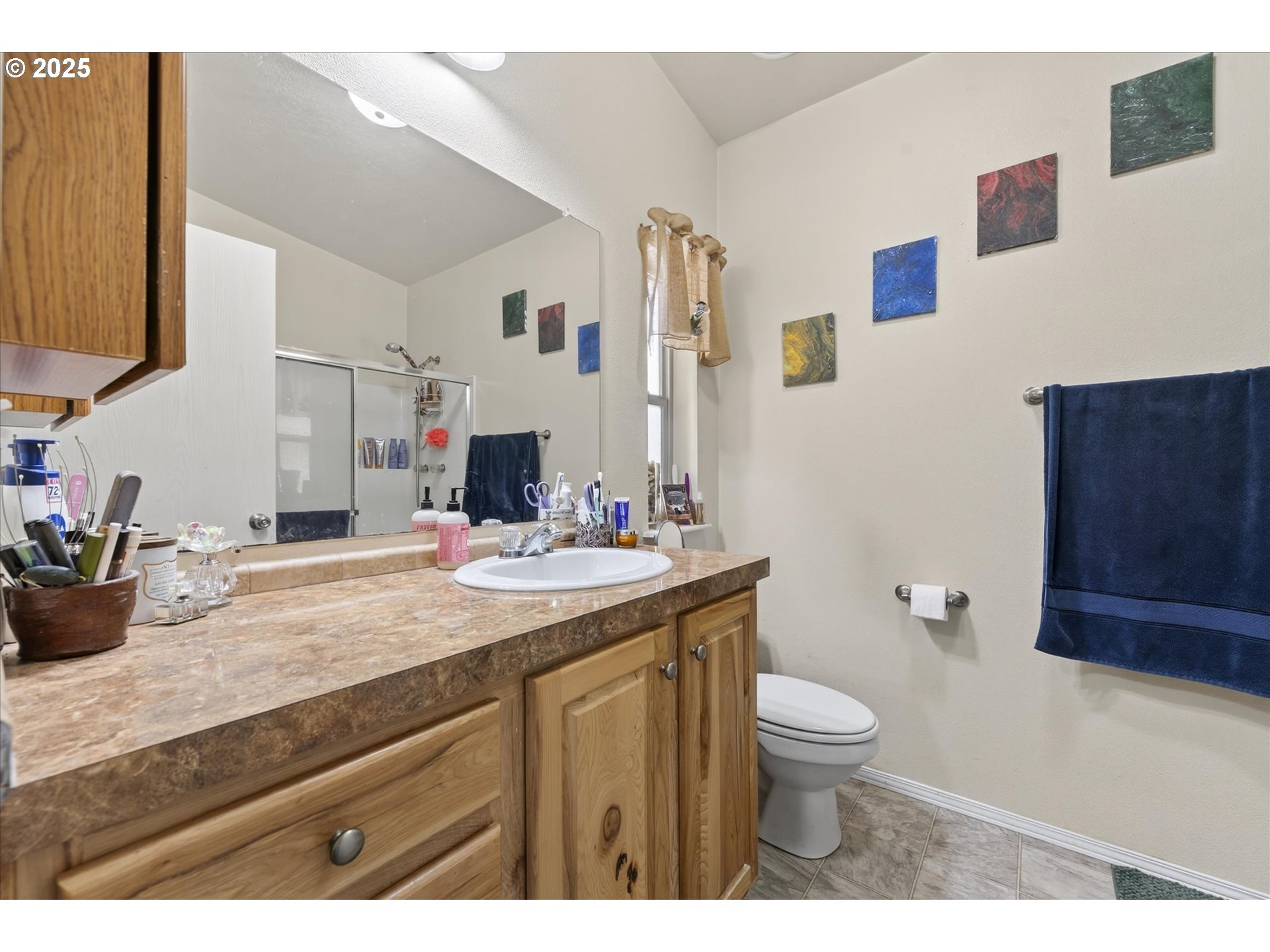 600 Northwest Cupid Avenue Sumpter, OR 97877 - Photo 14 of 29 a bathroom with a granite countertop sink toilet and mirror
