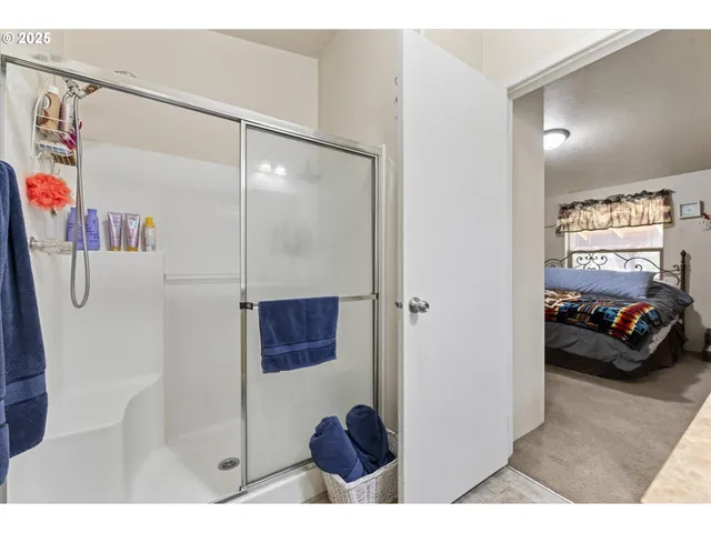 a living room with furniture and a clock
