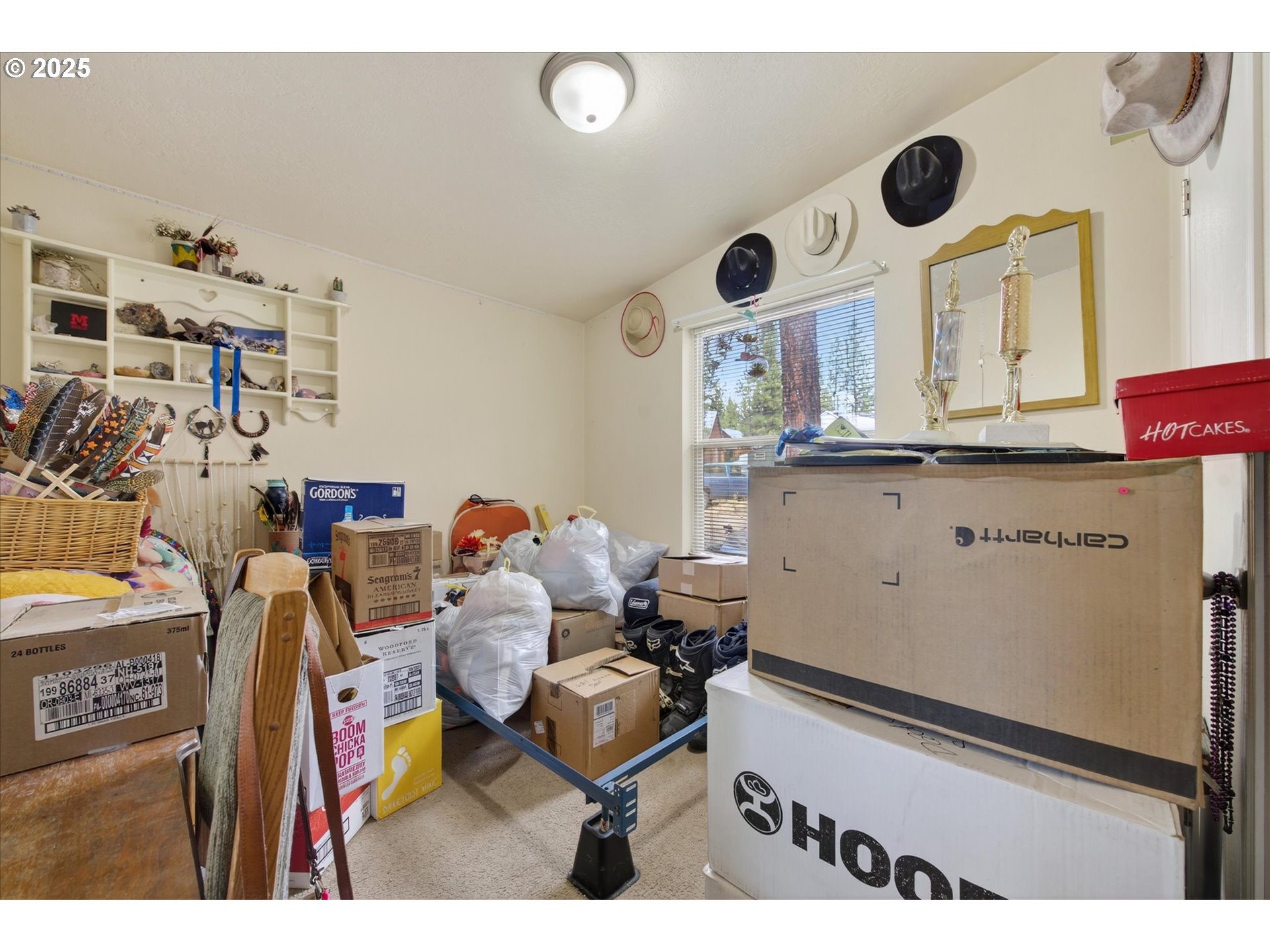 600 Northwest Cupid Avenue Sumpter, OR 97877 - Photo 16 of 29 a living room with furniture and a clock