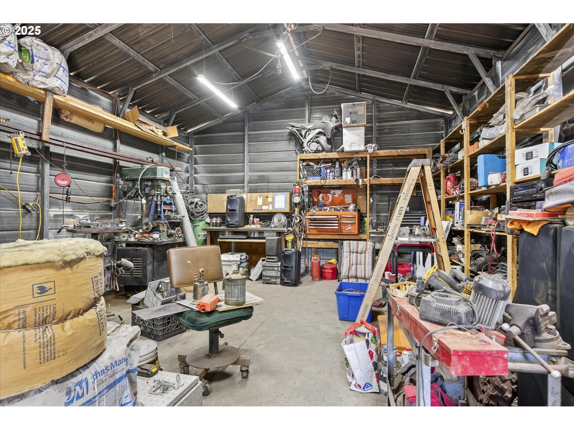 600 Northwest Cupid Avenue Sumpter, OR 97877 - Photo 19 of 29 a storage room with gym equipment