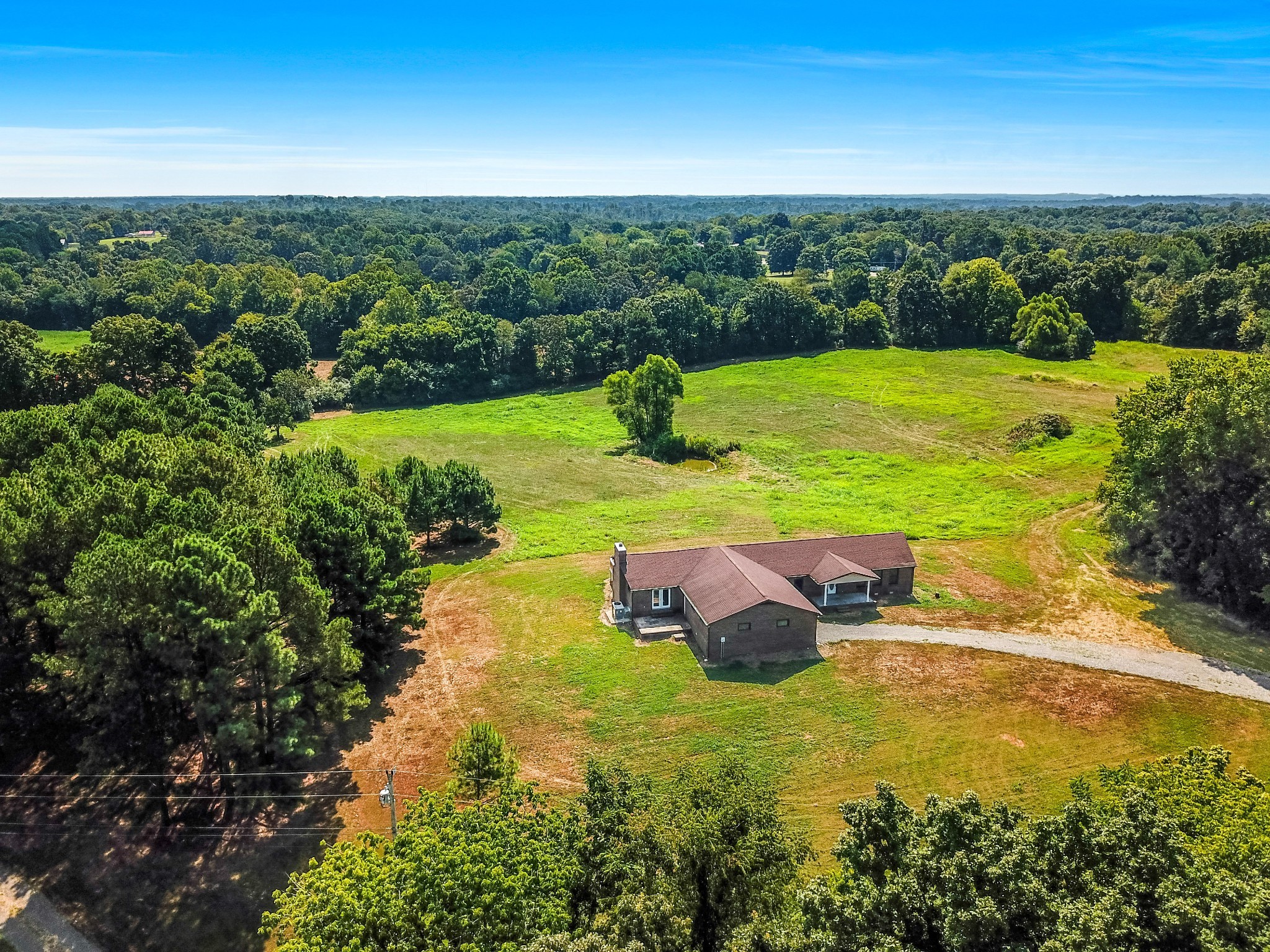 239 Wayne Threatt Road Dover, TN 37058 - Photo 1 of 41 a view of a lake with a yard
