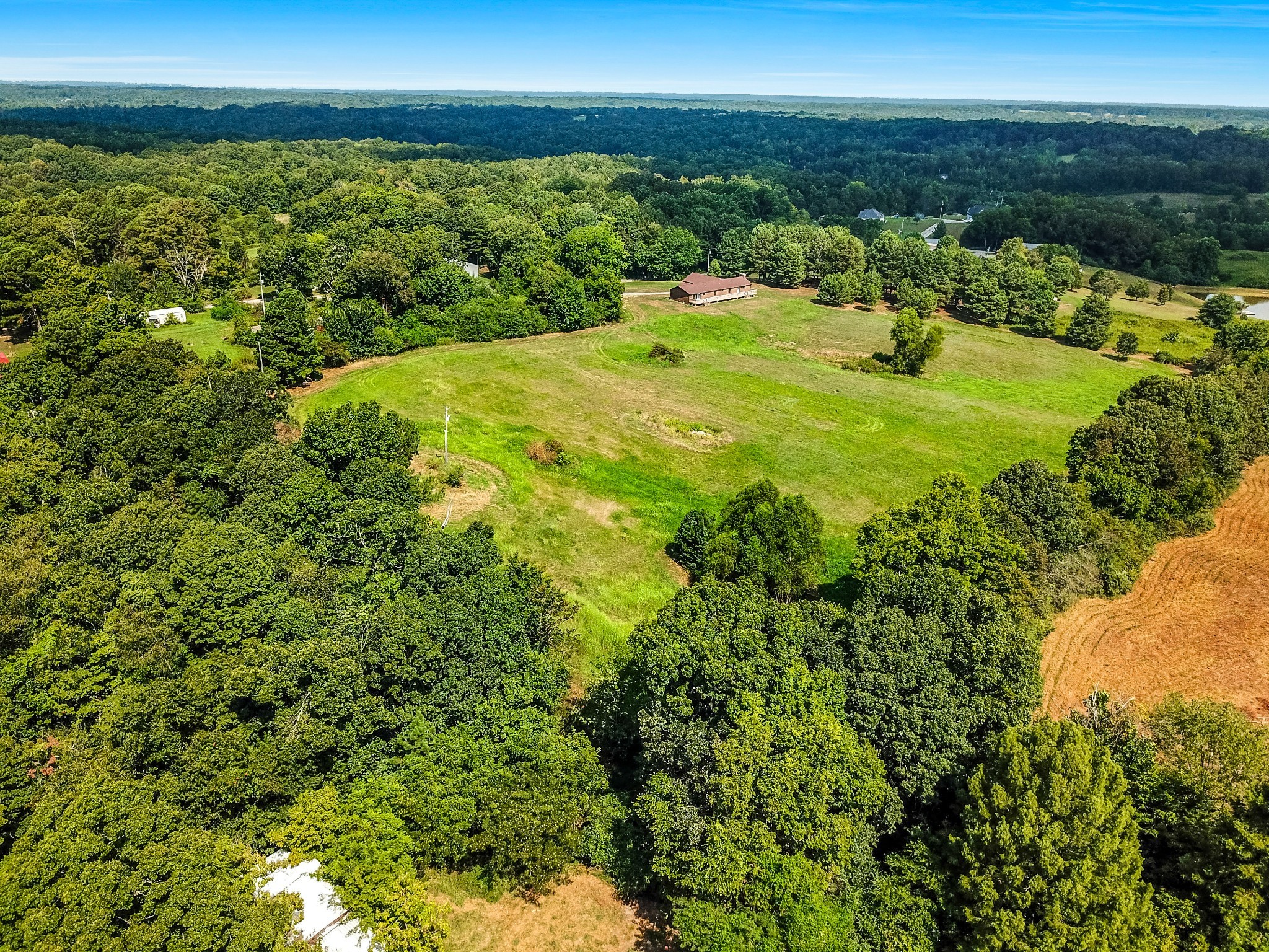 239 Wayne Threatt Road Dover, TN 37058 - Photo 18 of 41 a view of a lake with a city