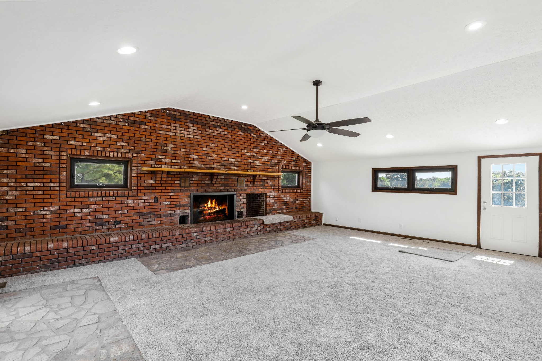 239 Wayne Threatt Road Dover, TN 37058 - Photo 21 of 41 a view of a livingroom with fireplace and window