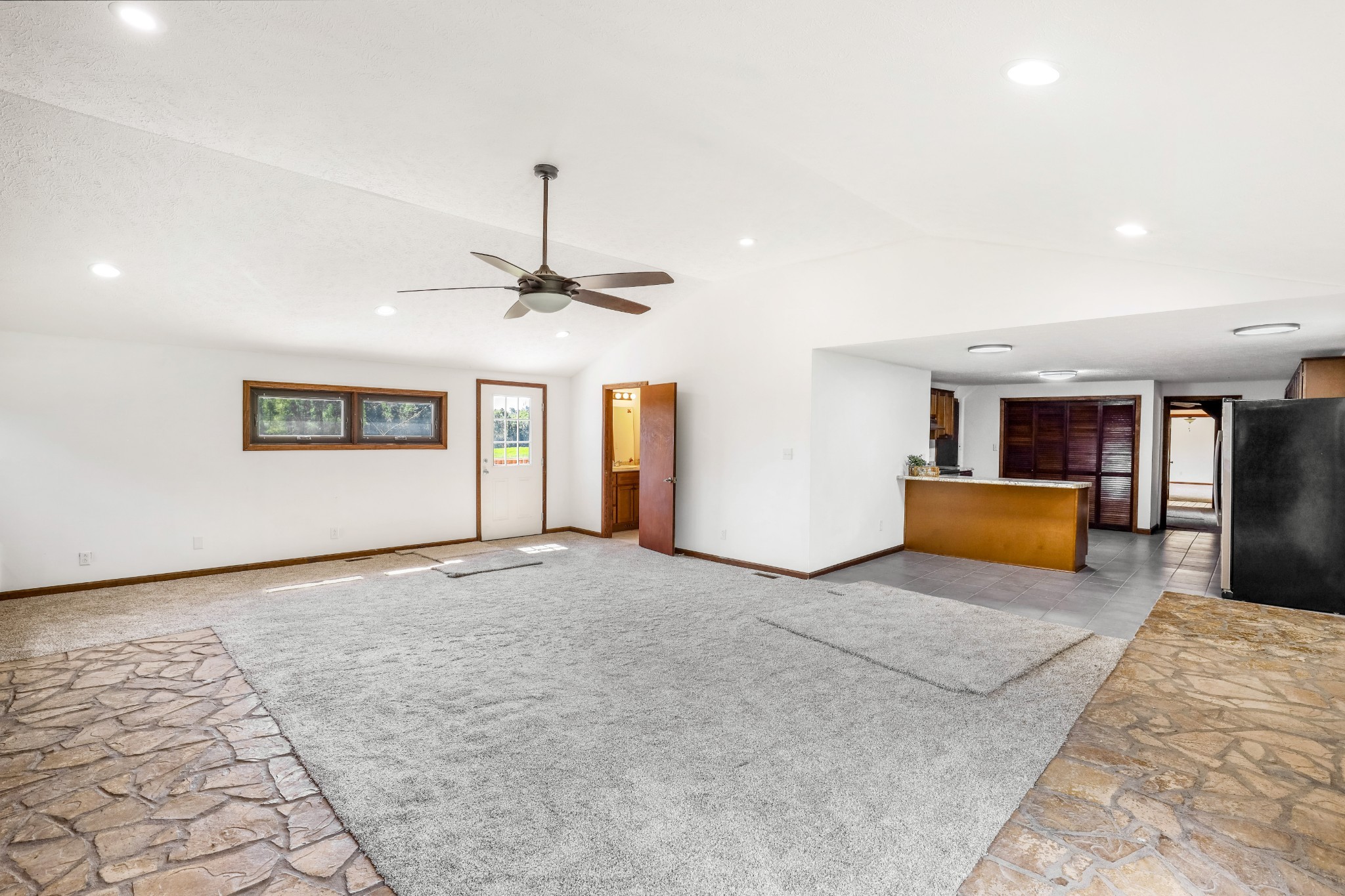 239 Wayne Threatt Road Dover, TN 37058 - Photo 28 of 41 a view of a livingroom with a staircase