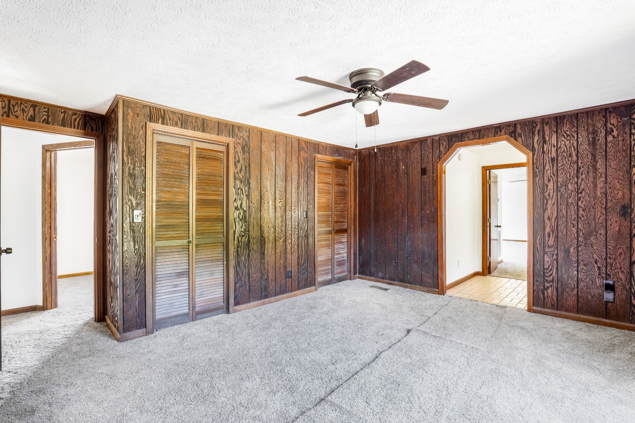 239 Wayne Threatt Road Dover, TN 37058 - Photo 33 of 41 a view of empty room with wooden floor and fan