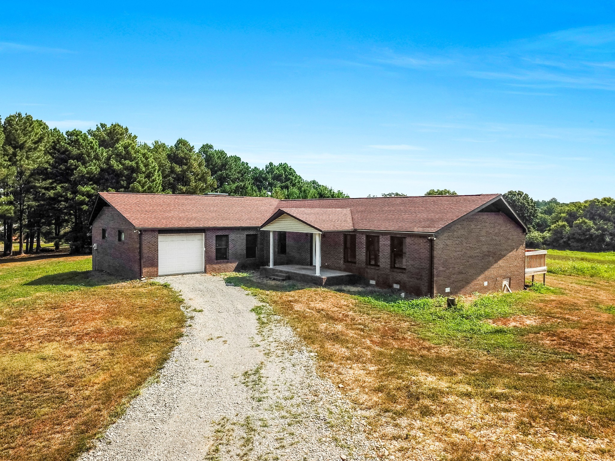 239 Wayne Threatt Road Dover, TN 37058 - Photo 5 of 41 a view of a house with a yard