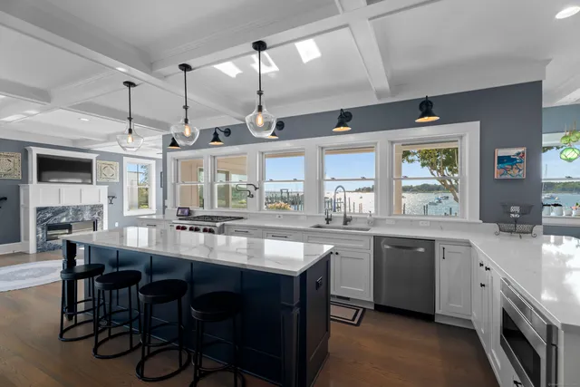 a kitchen with lots of counter top space and dining table