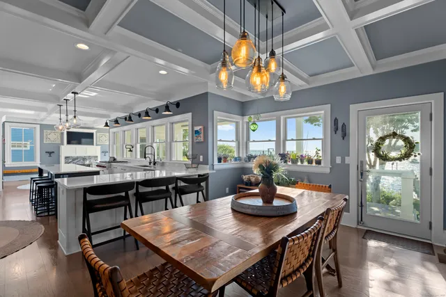a view of a dining room with furniture window and outside view