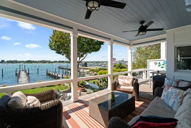a view of a patio with couches chairs dining table and chairs