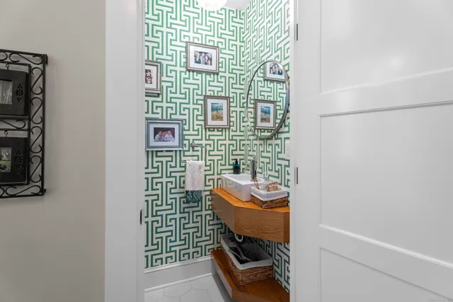 a spacious bedroom with a bed and window