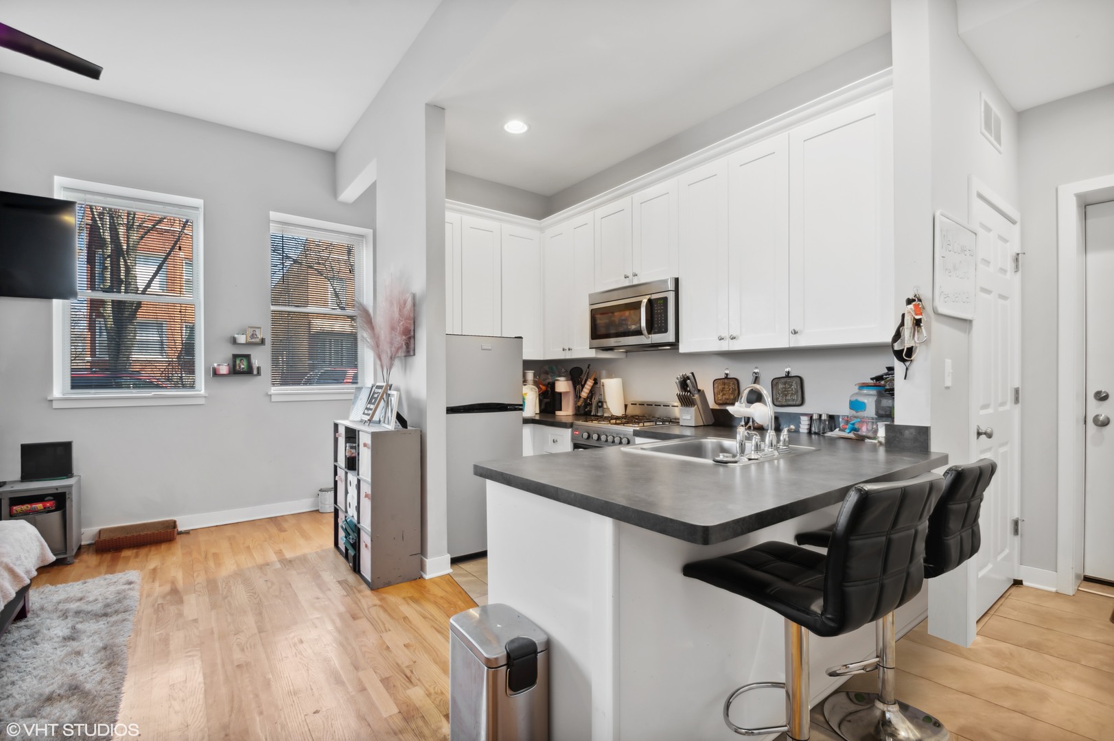 2458 North Lotus Avenue Chicago, IL 60639 - Photo 19 of 22 a kitchen with sink cabinets and appliances