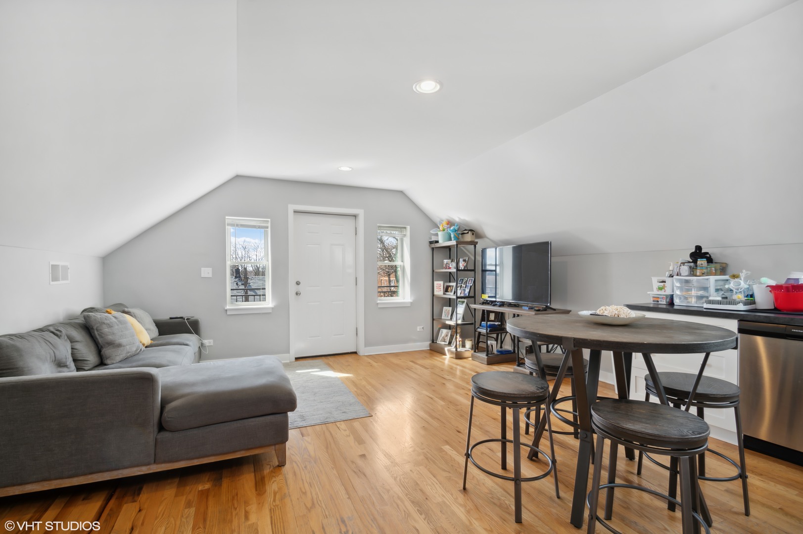 2458 North Lotus Avenue Chicago, IL 60639 - Photo 20 of 22 a living room with furniture and a wooden floor
