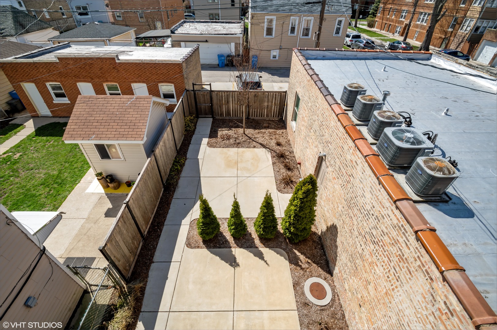 2458 North Lotus Avenue Chicago, IL 60639 - Photo 4 of 22 an aerial view of a house with roof deck