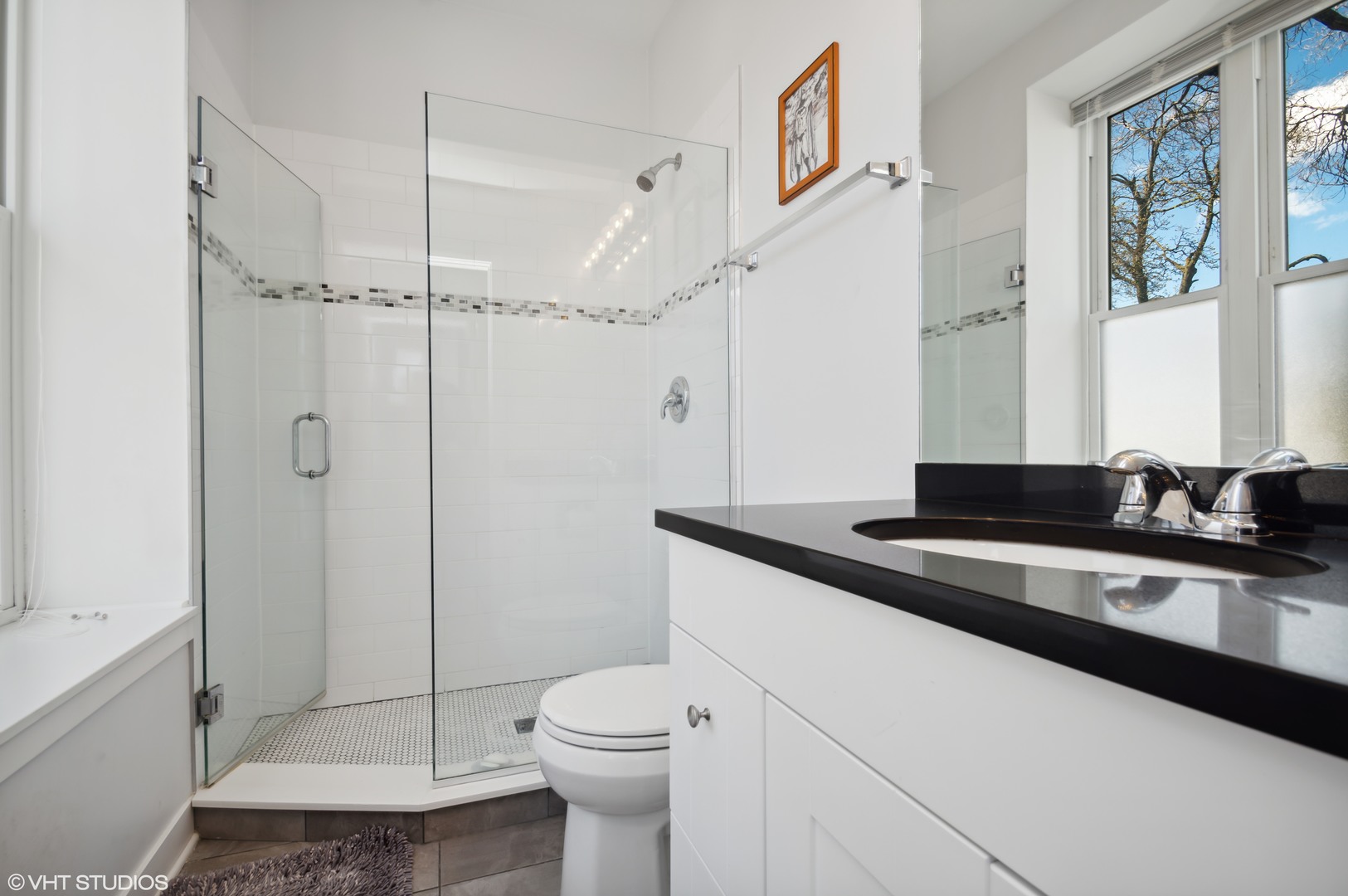 2458 North Lotus Avenue Chicago, IL 60639 - Photo 10 of 22 a bathroom with a granite countertop sink a toilet and shower