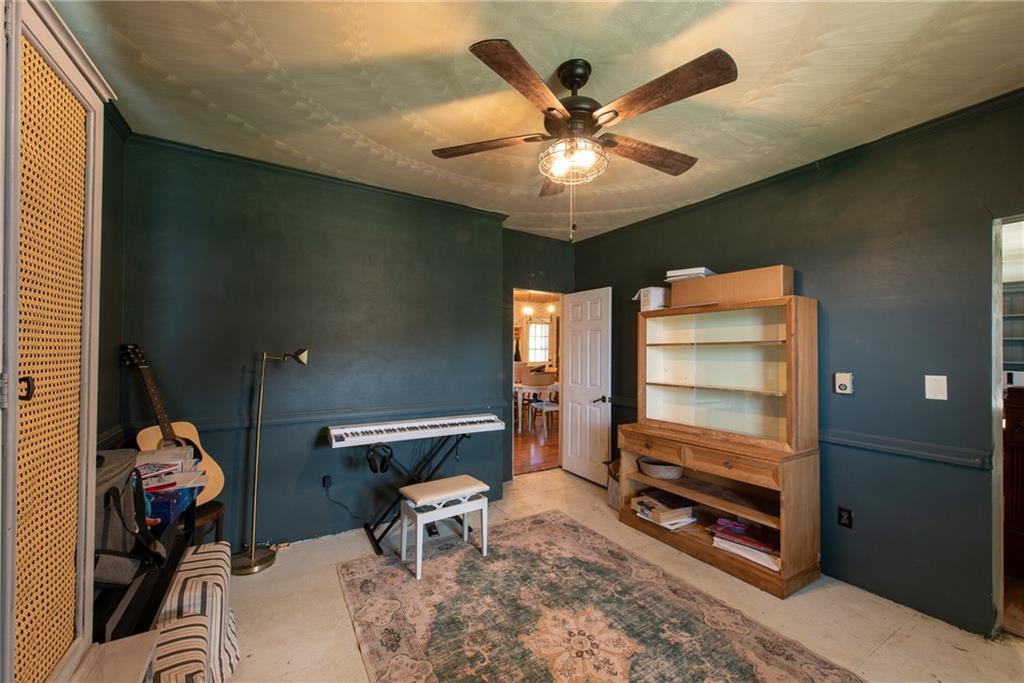 1182 State Rte 1035 Templeton, PA 16259 - Photo 18 of 50 a bedroom with a bed and a chandelier