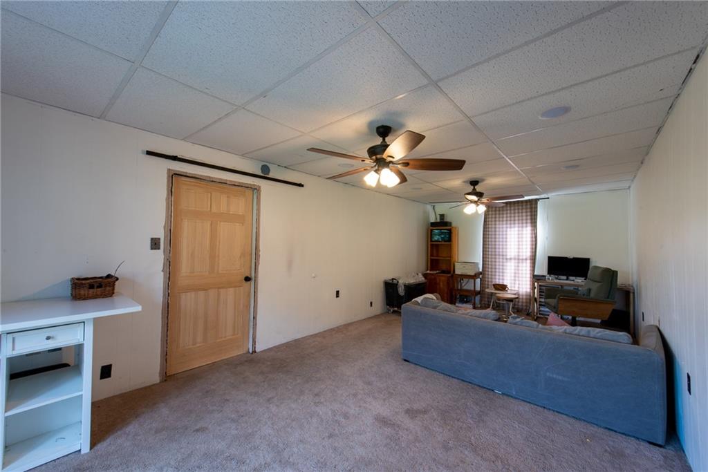 1182 State Rte 1035 Templeton, PA 16259 - Photo 22 of 50 a living room with furniture and a flat screen tv