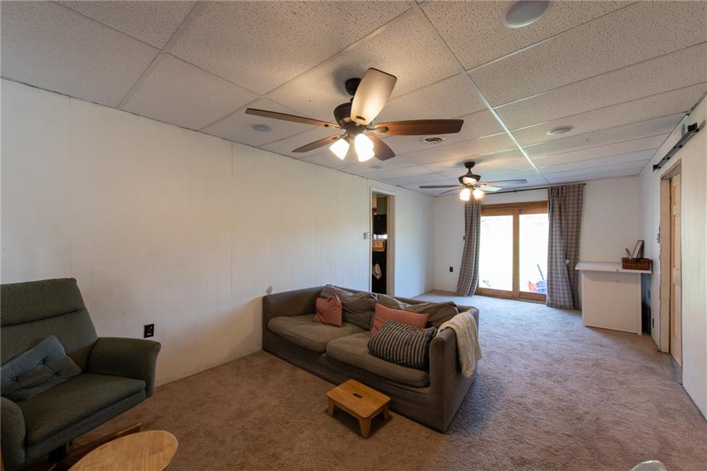 1182 State Rte 1035 Templeton, PA 16259 - Photo 24 of 50 a living room with furniture and a ceiling fan