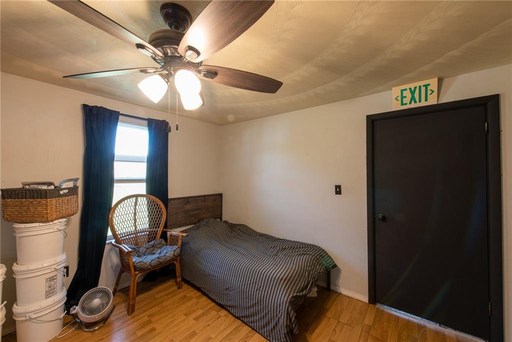 1182 State Rte 1035 Templeton, PA 16259 - Photo 30 of 50 a bedroom with a bed and wooden floor