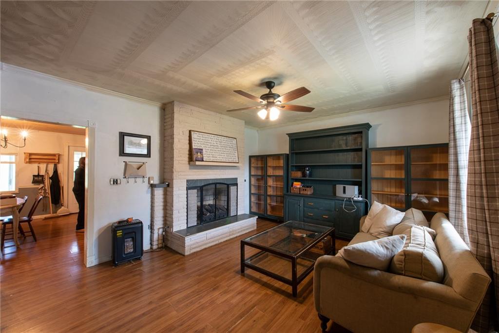 1182 State Rte 1035 Templeton, PA 16259 - Photo 3 of 50 a living room with furniture a fireplace and a flat screen tv
