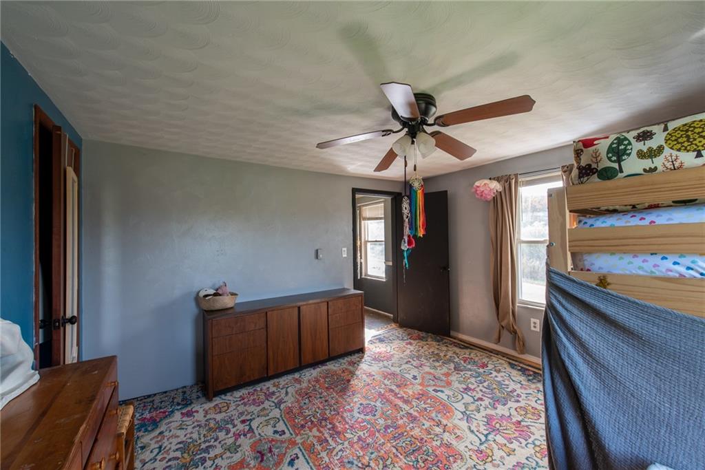 1182 State Rte 1035 Templeton, PA 16259 - Photo 36 of 50 a living room with stainless steel appliances furniture a rug and a large window