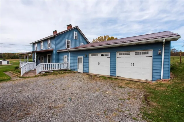 a house with yard in front of it