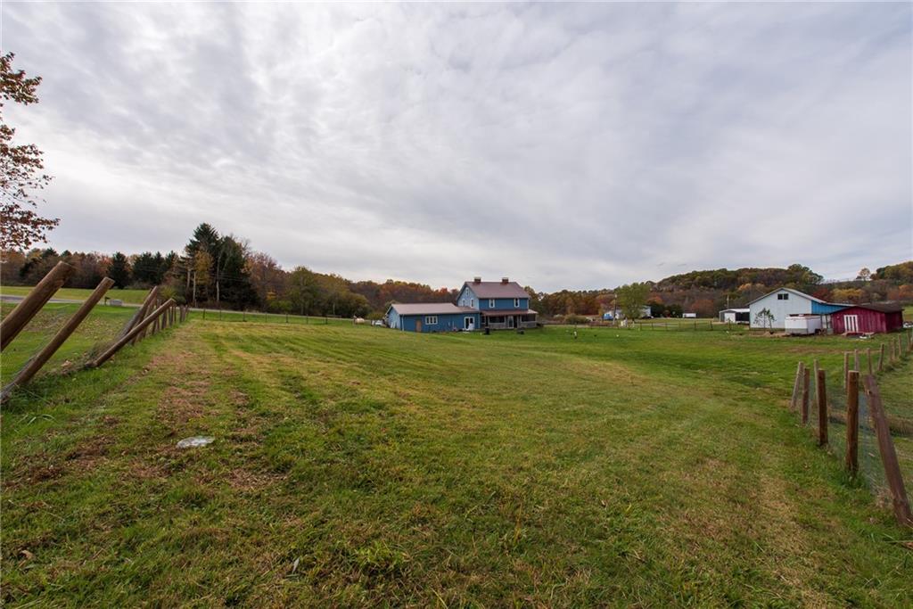 1182 State Rte 1035 Templeton, PA 16259 - Photo 42 of 50 a view of building with river and trees in the background