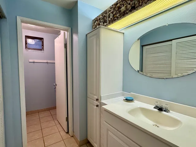 a bathroom with a bathtub and a sink
