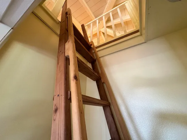 a view of balcony with wooden floor