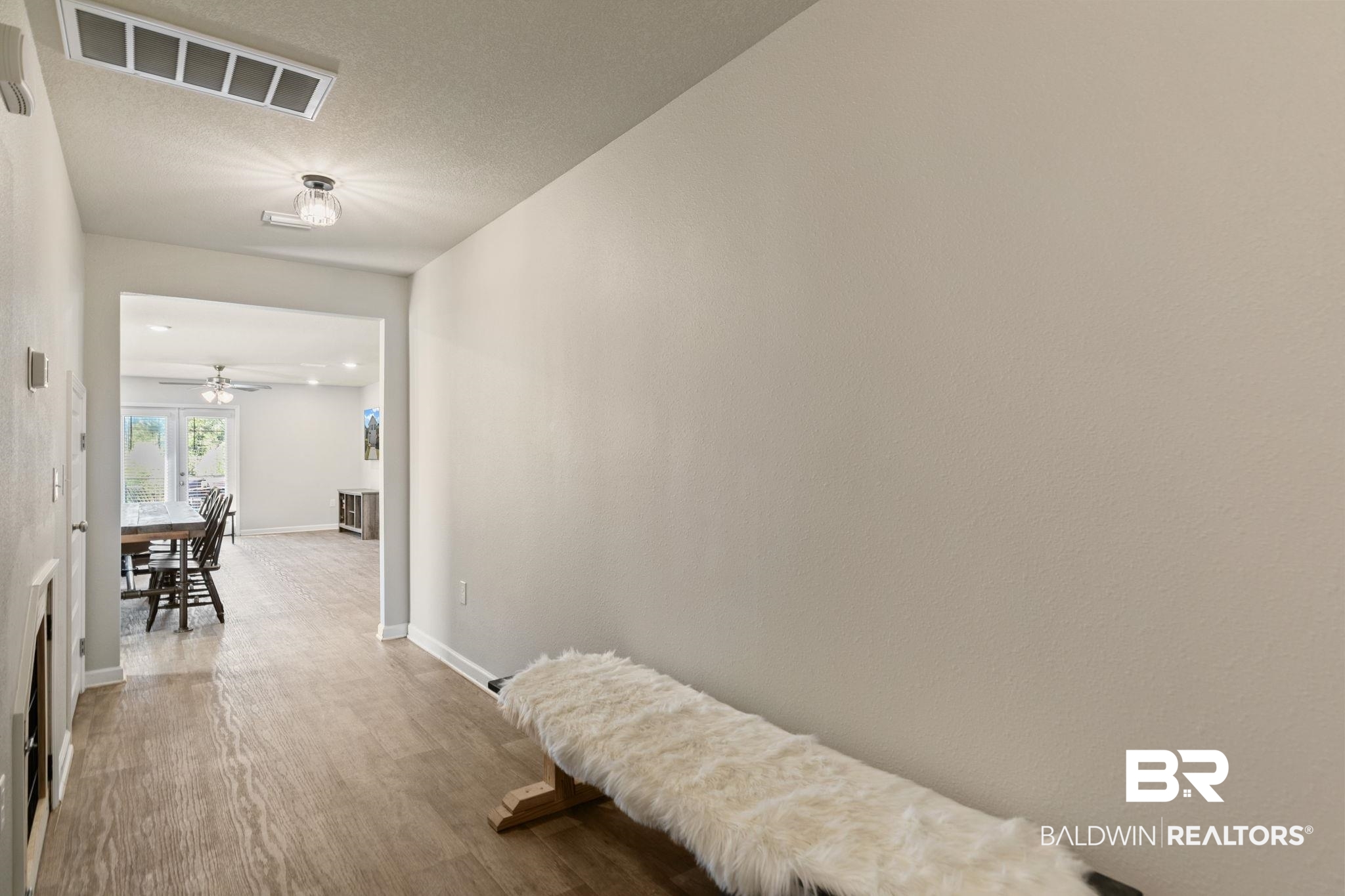 32234 Calder Court Daphne, AL 36527 - Photo 2 of 32 Corridor with wood finished floors and baseboards