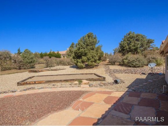 5732 Columbine Road Prescott, AZ 86305 - Photo 21 of 24 a view of a yard with wooden fence