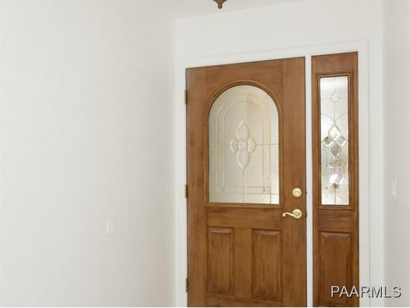 5732 Columbine Road Prescott, AZ 86305 - Photo 4 of 24 a front view of a house with entryway