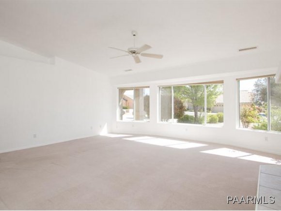 5732 Columbine Road Prescott, AZ 86305 - Photo 6 of 24 a view of an empty room with a window