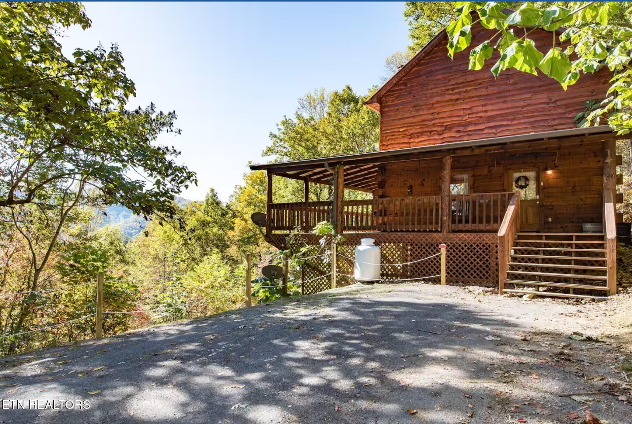 3031 Hatcher Top Road Sevierville, TN 37862 - Photo 1 of 21 front