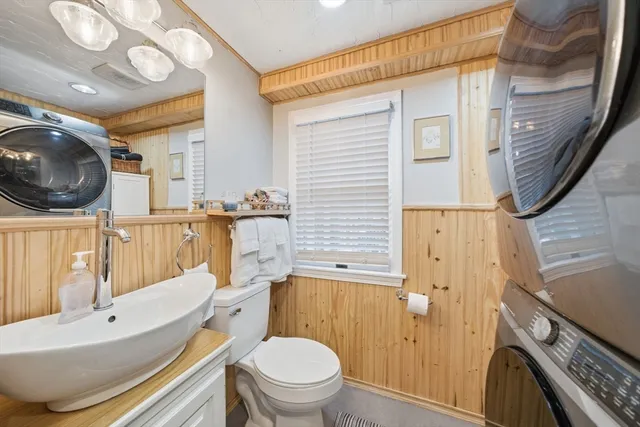 a bathroom with a toilet a sink and a bathtub