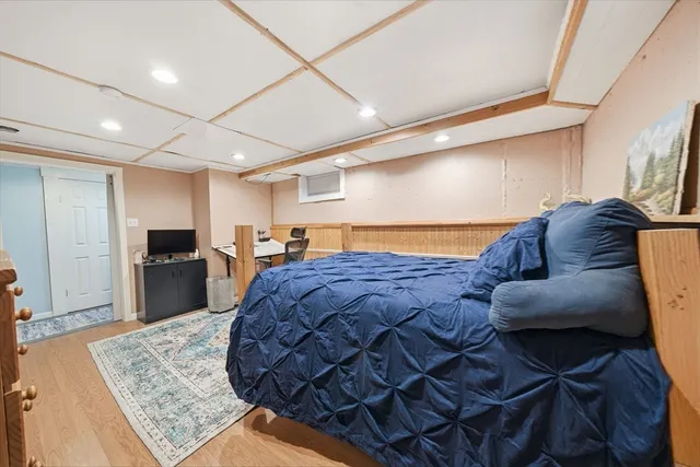 a bed room with a bed and a couch