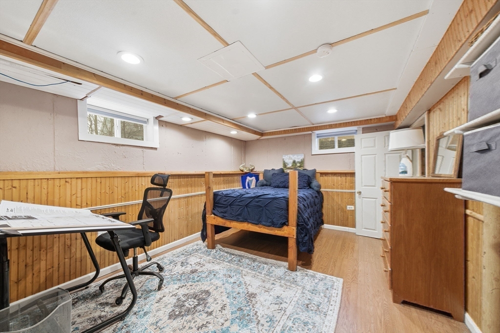 4 Laurel Street Woburn, MA 01801 - Photo 29 of 40 a view of a livingroom with furniture and a workspace