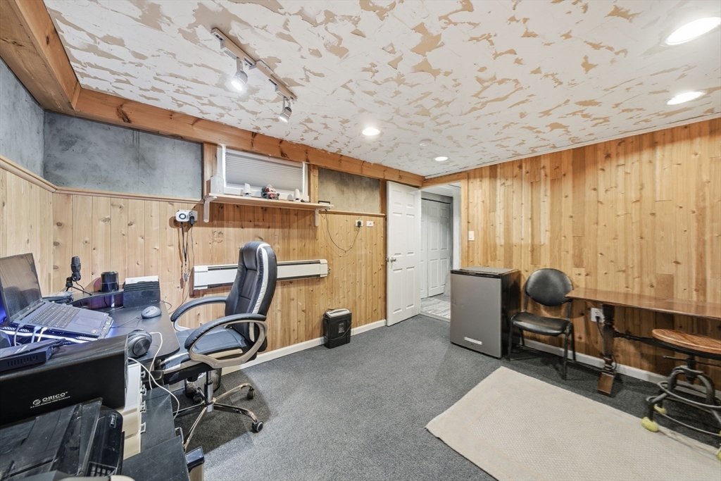 4 Laurel Street Woburn, MA 01801 - Photo 30 of 40 a view of a workspace with furniture and a window