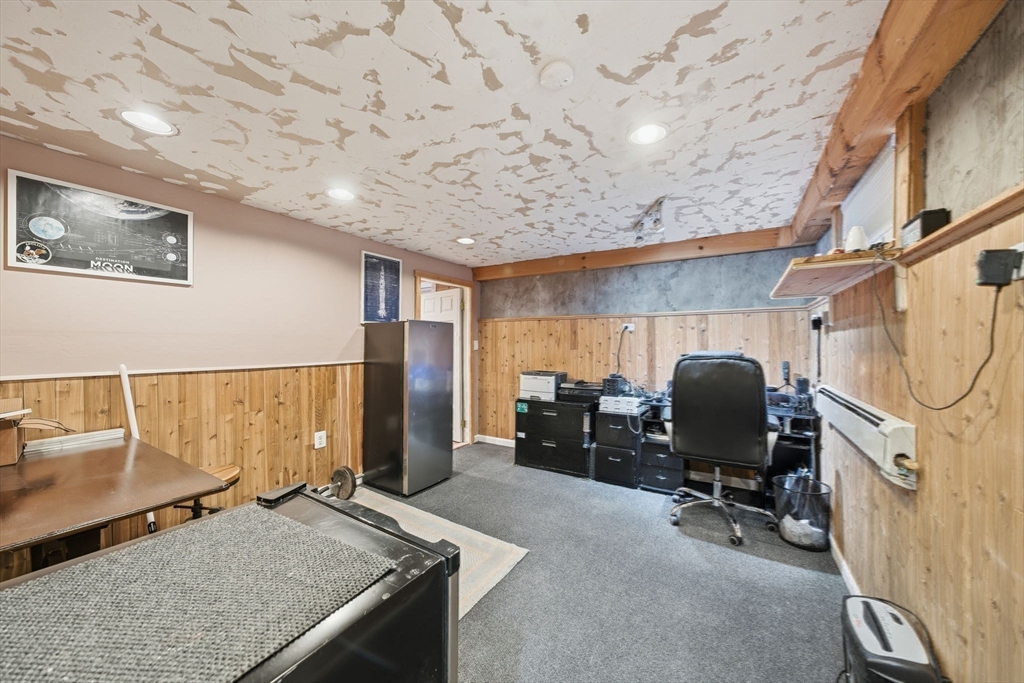 4 Laurel Street Woburn, MA 01801 - Photo 31 of 40 a view of a workspace with furniture and a window