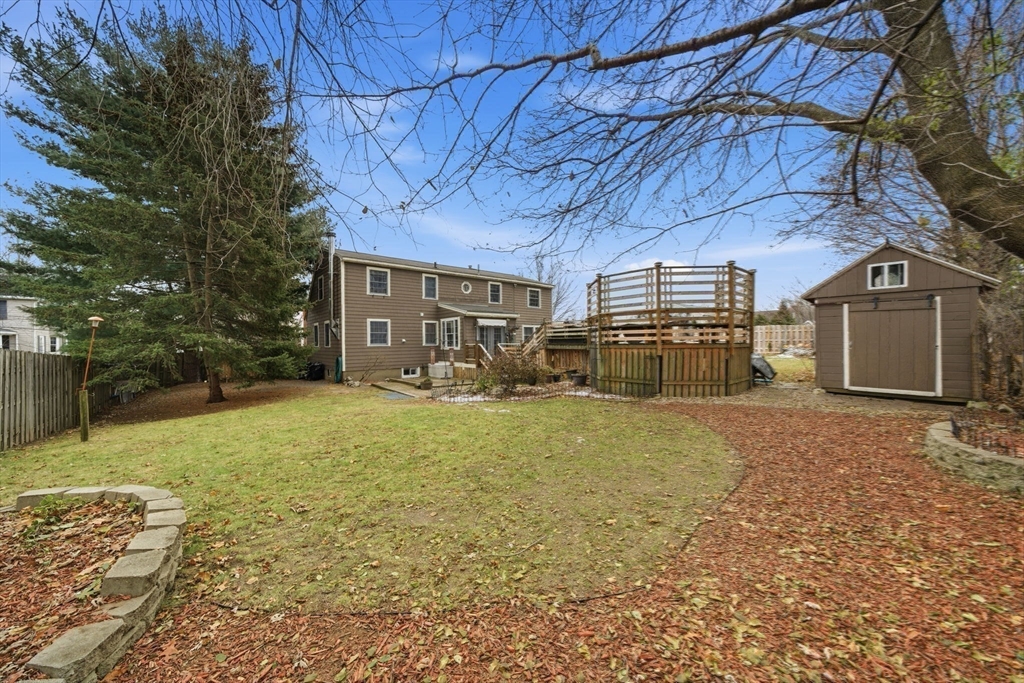 4 Laurel Street Woburn, MA 01801 - Photo 34 of 40 a view of a backyard of the house