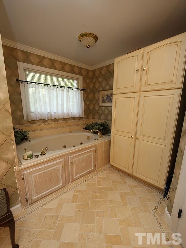 321 Jellison Court Raleigh, NC 27615 - Photo 14 of 24 Ceramic Tiled Floor, Built in Cabinet