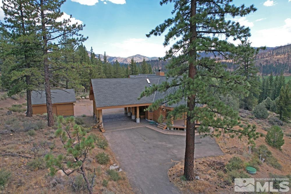 650 Raymond View Road Markleeville, CA 96120 - Photo 34 of 37 a view of a backyard with plants and large trees