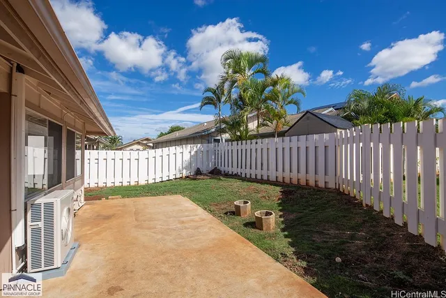 a view of a porch with wooden floor