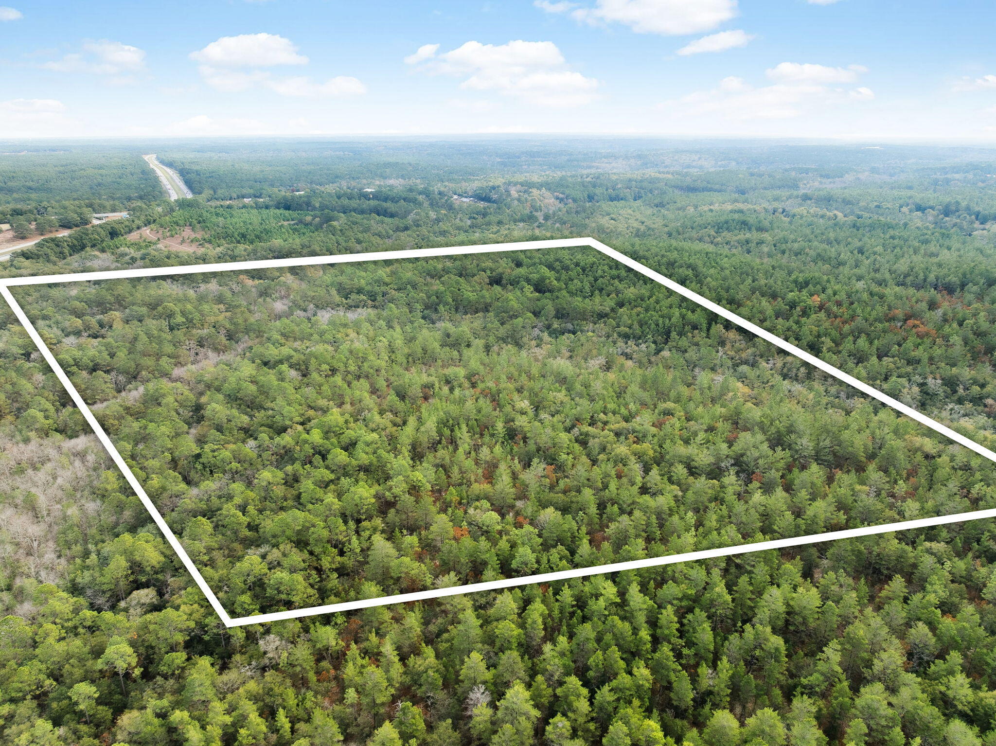 0 Boy Scout Road DeFuniak Springs, FL 32435 - Photo 5 of 27 a view of a balcony with an outdoor space