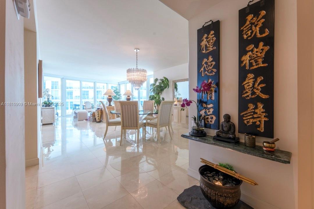 2127 Brickell Avenue, Unit 3304 Miami, FL 33129 - Photo 12 of 39 a view of a room with gym equipment