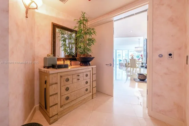 a bathroom with a double vanity sink toilet and shower